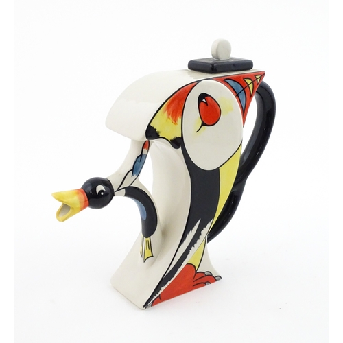 86 - A Lorna Bailey limited edition Puffin teapot. Marked and signed under, and numbered 20 / 50. With ce... 
