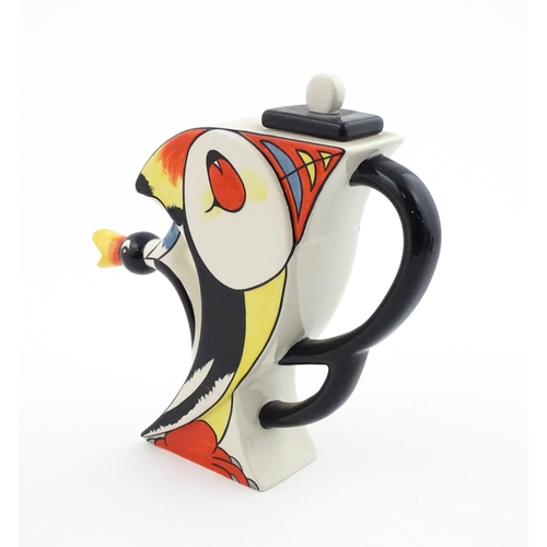 86 - A Lorna Bailey limited edition Puffin teapot. Marked and signed under, and numbered 20 / 50. With ce... 