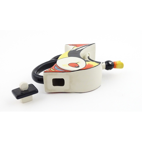 86 - A Lorna Bailey limited edition Puffin teapot. Marked and signed under, and numbered 20 / 50. With ce... 