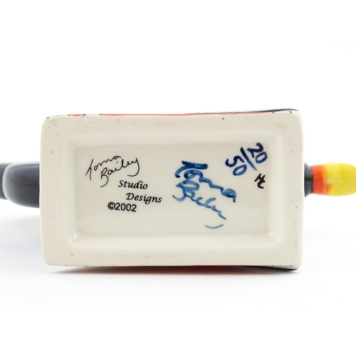 86 - A Lorna Bailey limited edition Puffin teapot. Marked and signed under, and numbered 20 / 50. With ce... 