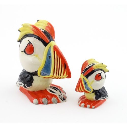 87 - Two Lorna Bailey models of Percy the Puffin. Both signed under. Largest approx. 6 1/2