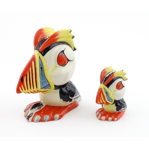 87 - Two Lorna Bailey models of Percy the Puffin. Both signed under. Largest approx. 6 1/2