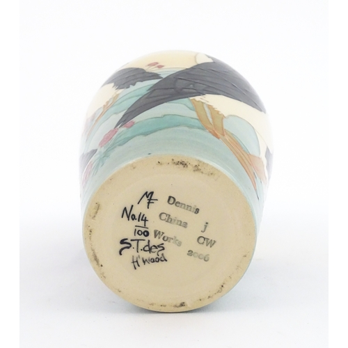 92 - A Dennis China Works vase with puffin detail. Marked under no. 14 / 100. Approx. 8