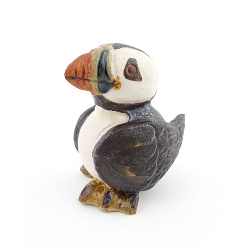 98 - A Zoo Original studio pottery model of a Puffin. Signed under Mini Puffin, no. 58. Approx. 4