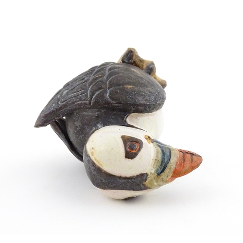 98 - A Zoo Original studio pottery model of a Puffin. Signed under Mini Puffin, no. 58. Approx. 4