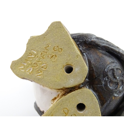 98 - A Zoo Original studio pottery model of a Puffin. Signed under Mini Puffin, no. 58. Approx. 4