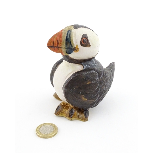 98 - A Zoo Original studio pottery model of a Puffin. Signed under Mini Puffin, no. 58. Approx. 4