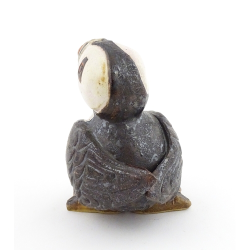 98 - A Zoo Original studio pottery model of a Puffin. Signed under Mini Puffin, no. 58. Approx. 4