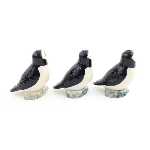 99 - Three Babbacombe Pottery cruets modelled as Puffins. Marked under. Approx. 3 1/4