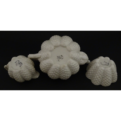 72 - A Belleek tea set in the Cone pattern, comprising teapot, milk jug, sugar bowl and four cups and sau... 