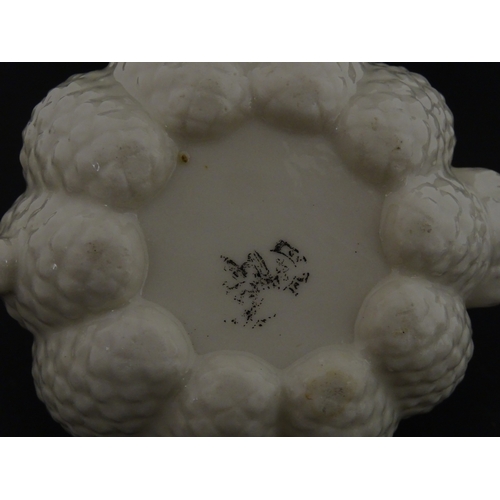 72 - A Belleek tea set in the Cone pattern, comprising teapot, milk jug, sugar bowl and four cups and sau... 