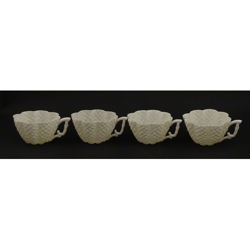 72 - A Belleek tea set in the Cone pattern, comprising teapot, milk jug, sugar bowl and four cups and sau... 