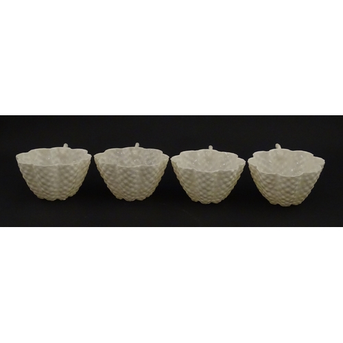 72 - A Belleek tea set in the Cone pattern, comprising teapot, milk jug, sugar bowl and four cups and sau... 