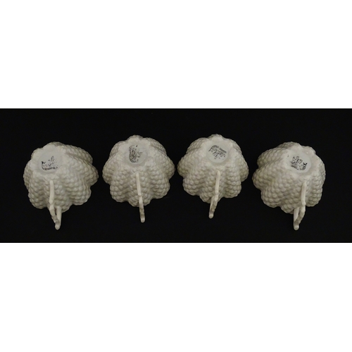 72 - A Belleek tea set in the Cone pattern, comprising teapot, milk jug, sugar bowl and four cups and sau... 