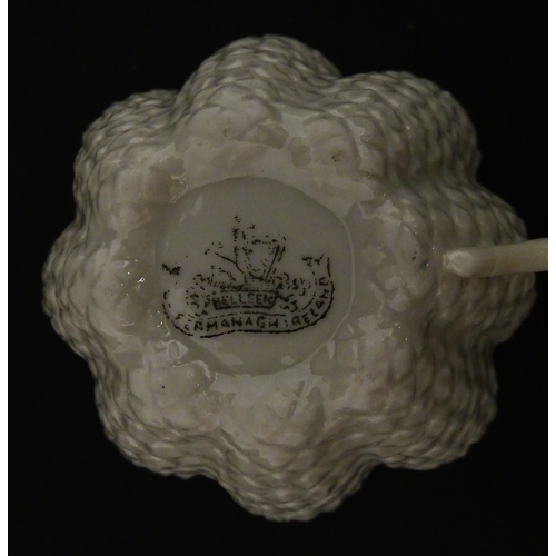 72 - A Belleek tea set in the Cone pattern, comprising teapot, milk jug, sugar bowl and four cups and sau... 