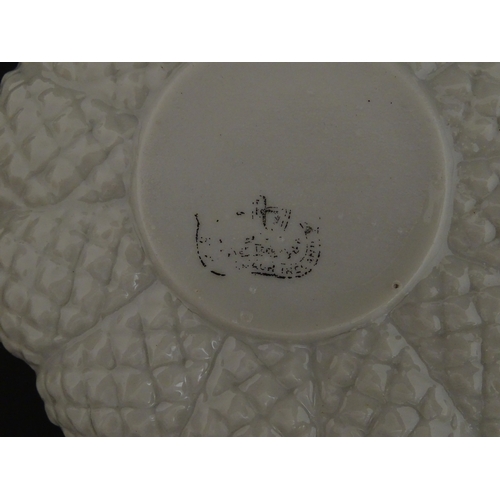 72 - A Belleek tea set in the Cone pattern, comprising teapot, milk jug, sugar bowl and four cups and sau... 