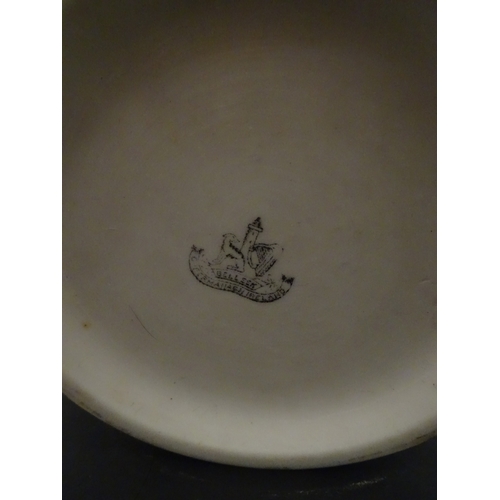 66 - A Belleek Rathmore jardiniere / planter decorated with birds, flowers and foliage. Marked with Secon... 