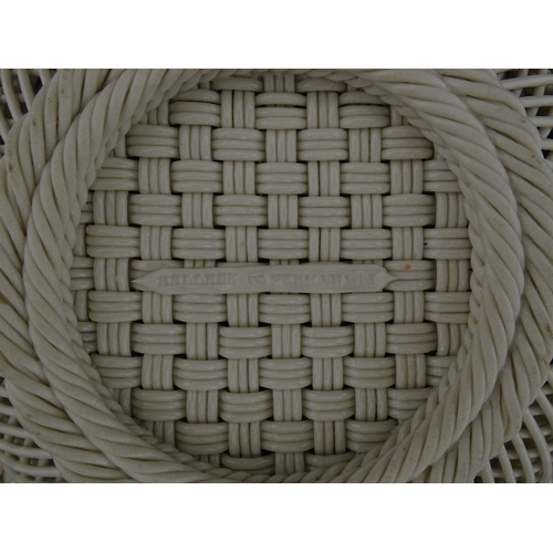 67 - A Belleek three strand Lily Basket having lattice work with ribbon edges, decorated with lily of the... 