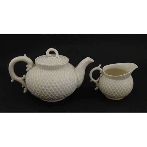 68 - Belleek tea wares in the Thistle pattern comprising teapot, milk jug and two cups and saucers. Marke... 
