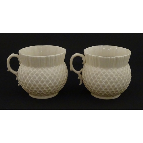 68 - Belleek tea wares in the Thistle pattern comprising teapot, milk jug and two cups and saucers. Marke... 