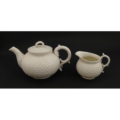 68 - Belleek tea wares in the Thistle pattern comprising teapot, milk jug and two cups and saucers. Marke... 