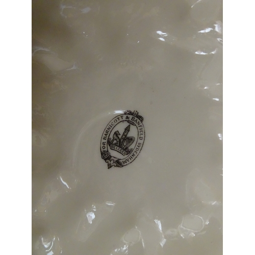76 - A Belleek Cardium Shell on Coral centrepiece. Impressed with First Period mark under, and stamped wi... 