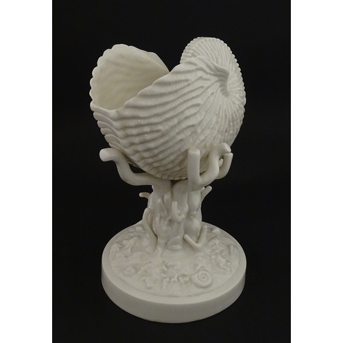 76 - A Belleek Cardium Shell on Coral centrepiece. Impressed with First Period mark under, and stamped wi... 