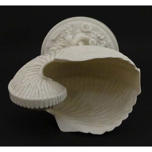76 - A Belleek Cardium Shell on Coral centrepiece. Impressed with First Period mark under, and stamped wi... 