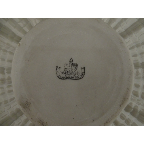 77 - A Belleek Tridacna pattern cake / bread plate. Marked with Second Period mark under. Approx. 11 1/2