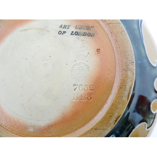 108 - A Royal Doulton Art Union of London stoneware bowl bowl with cobalt foliate decoration. Marked under... 