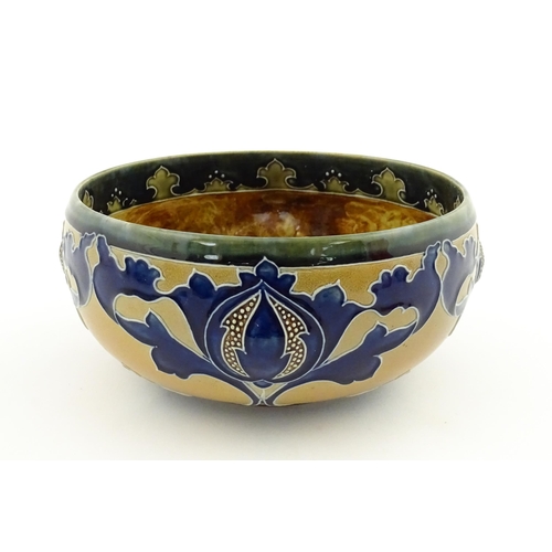 108 - A Royal Doulton Art Union of London stoneware bowl bowl with cobalt foliate decoration. Marked under... 