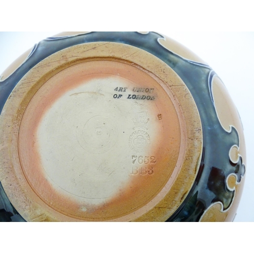 108 - A Royal Doulton Art Union of London stoneware bowl bowl with cobalt foliate decoration. Marked under... 