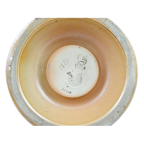 110 - A Royal Doulton stoneware match striker with stylised foliate detail to rim. Marked under. Approx. 2... 