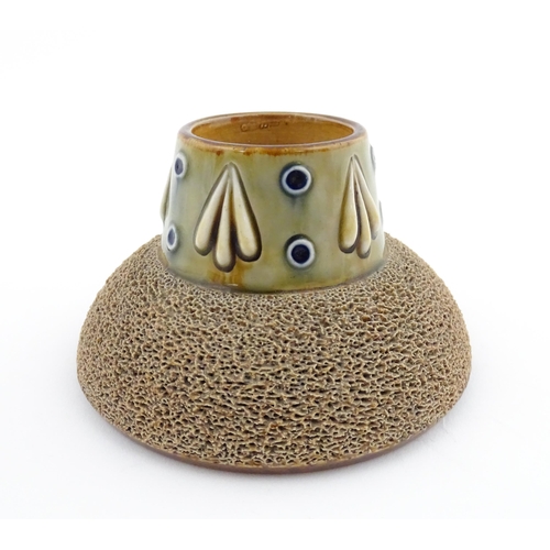 110 - A Royal Doulton stoneware match striker with stylised foliate detail to rim. Marked under. Approx. 2... 