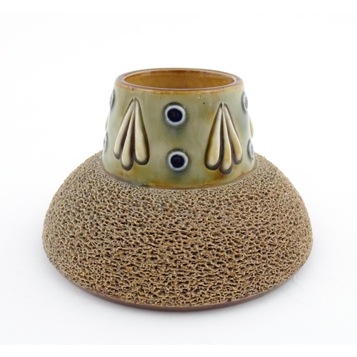 110 - A Royal Doulton stoneware match striker with stylised foliate detail to rim. Marked under. Approx. 2... 