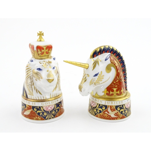 112 - A pair of Royal Worcester limited edition candle snuffers to commemorate HRH Queen Elizabeth's Golde... 