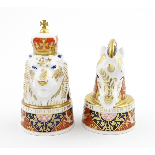112 - A pair of Royal Worcester limited edition candle snuffers to commemorate HRH Queen Elizabeth's Golde... 