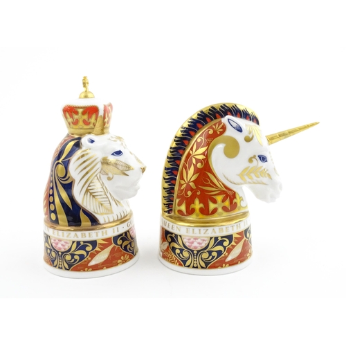 112 - A pair of Royal Worcester limited edition candle snuffers to commemorate HRH Queen Elizabeth's Golde... 