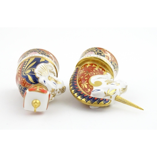 112 - A pair of Royal Worcester limited edition candle snuffers to commemorate HRH Queen Elizabeth's Golde... 