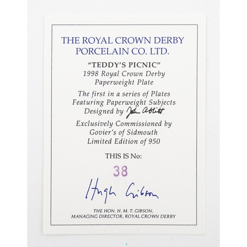 113 - A Royal Crown Derby paperweight modelled as a Schoolboy Teddy. Together with a boxed Royal Crown Der... 