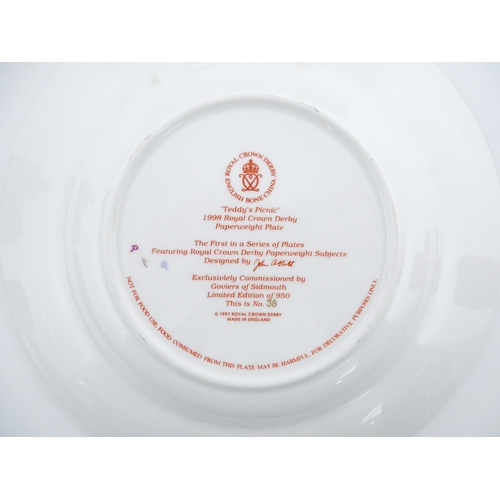 113 - A Royal Crown Derby paperweight modelled as a Schoolboy Teddy. Together with a boxed Royal Crown Der... 