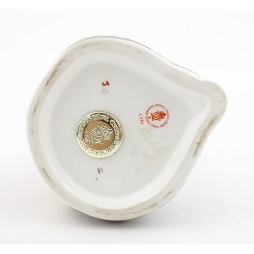 115 - A Royal Crown Derby paperweight modelled as a seated Panda. Boxed. Approx. 4 1/4