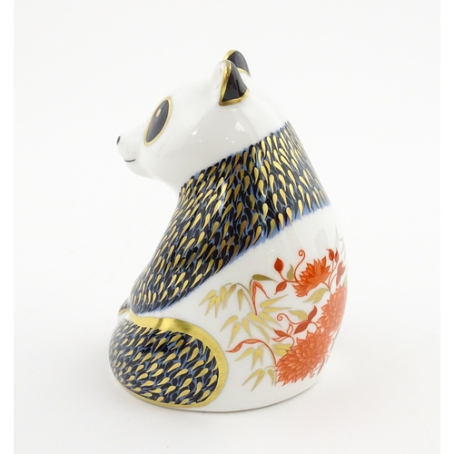 115 - A Royal Crown Derby paperweight modelled as a seated Panda. Boxed. Approx. 4 1/4