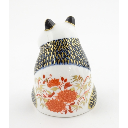 115 - A Royal Crown Derby paperweight modelled as a seated Panda. Boxed. Approx. 4 1/4
