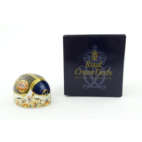 117 - A Royal Crown Derby paperweight modelled as a Blue Ladybird. Boxed. Approx. 1 1/2