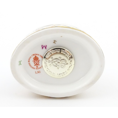 117 - A Royal Crown Derby paperweight modelled as a Blue Ladybird. Boxed. Approx. 1 1/2