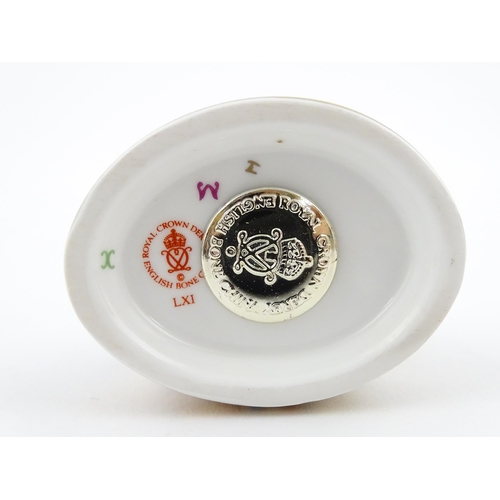 117 - A Royal Crown Derby paperweight modelled as a Blue Ladybird. Boxed. Approx. 1 1/2