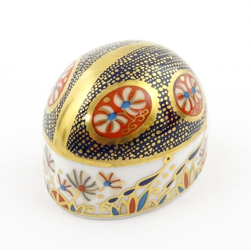 117 - A Royal Crown Derby paperweight modelled as a Blue Ladybird. Boxed. Approx. 1 1/2