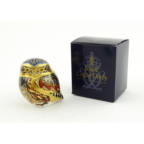 118 - A Royal Crown Derby paperweight modelled as a Little Owl. Boxed. Approx. 3 1/4