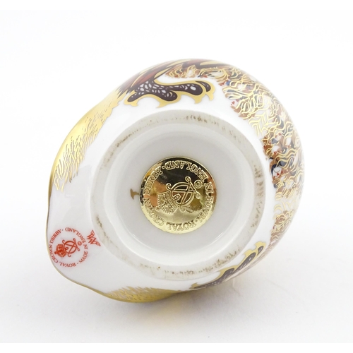 118 - A Royal Crown Derby paperweight modelled as a Little Owl. Boxed. Approx. 3 1/4